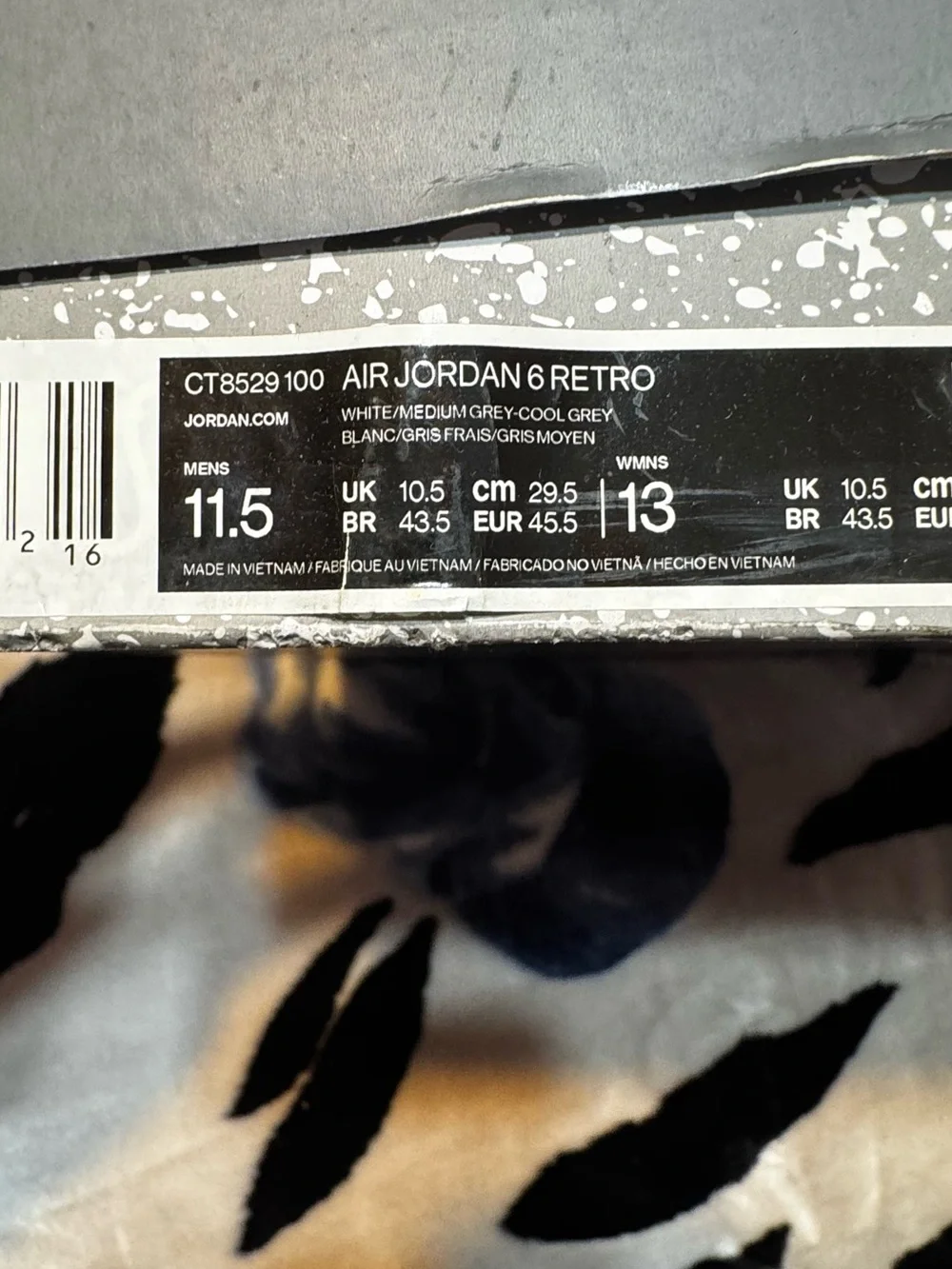 Jordan Grey and White Sneakers